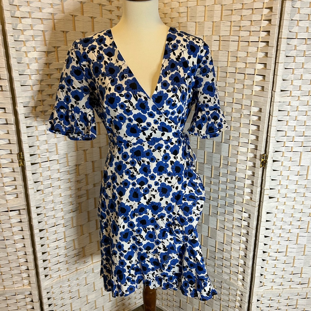 Blue and white floral print ruffle mini wrap dress